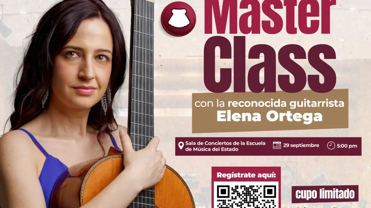 Guitarrista durante una clase magistral en un recinto cultural