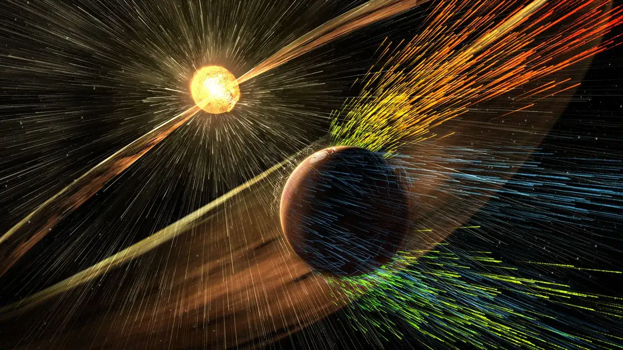 Ilustración de la sonda MAVEN orbitando Marte con auroras en la atmósfera